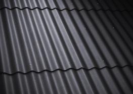Corrugated fibre cement and corrugated sheet